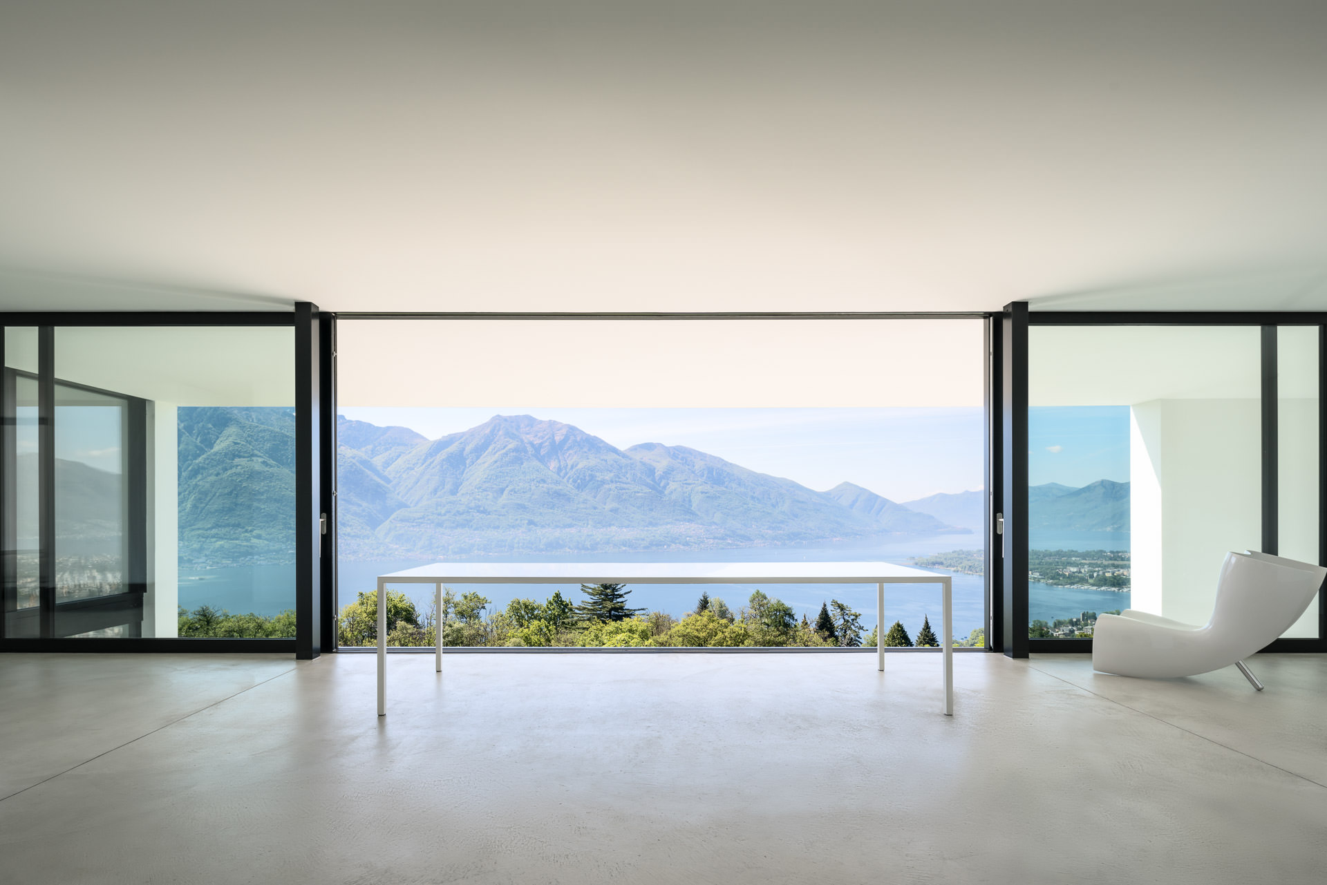 Interior Architectural Photography of the house in Ticino with a stunning view over the Lake and Maggia Delta