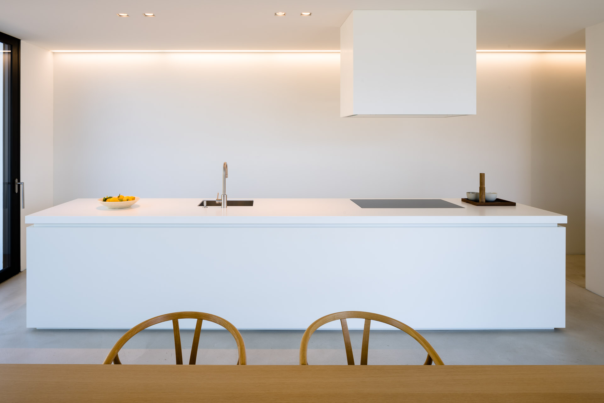 View to the free standing kitchen counter in a modern kitchen design - Interior Architectural Photography Switzerland