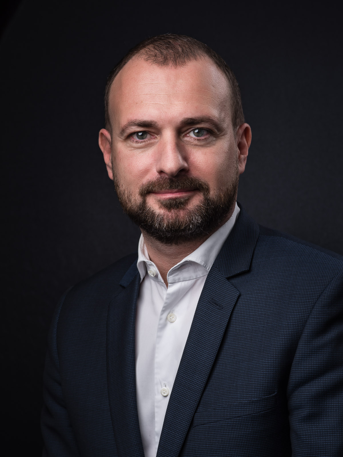 Corporate management portrait of coo. Executive committee photography.