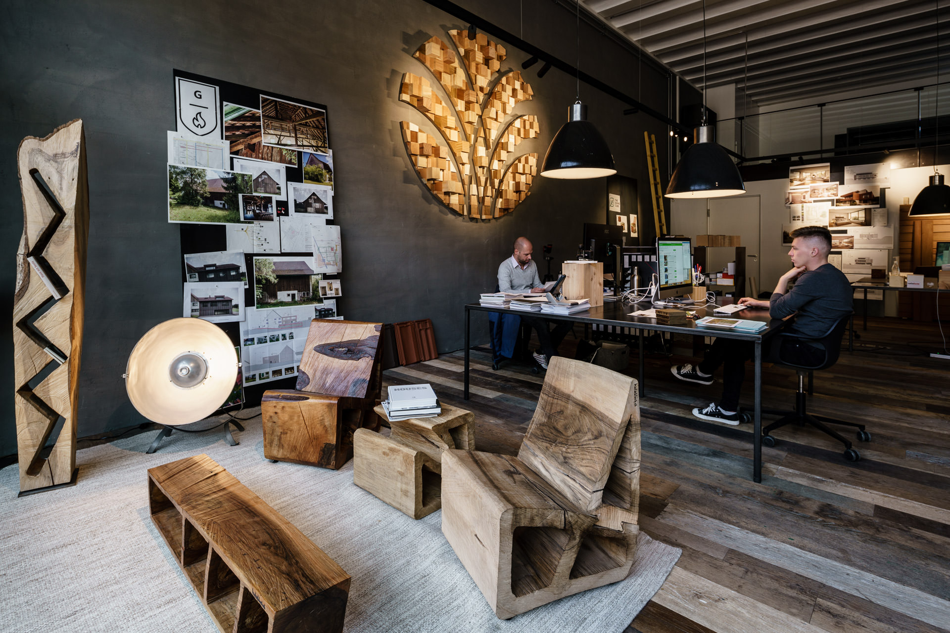 Wooden furniture in a real estate developer show room. Interior photos.