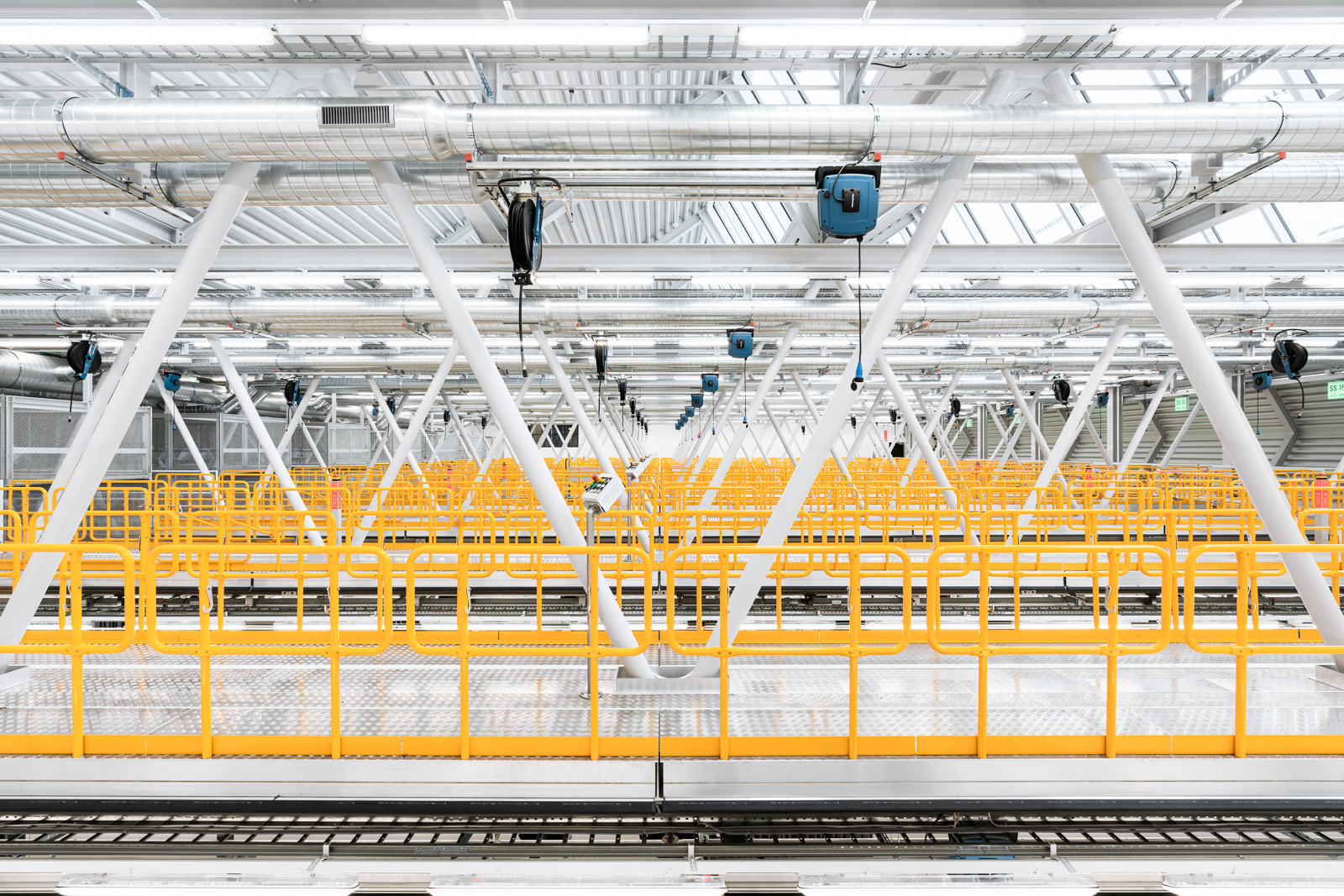 Industrial building with yellow metal bridges - VBZ garage Zurich